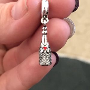 Authentic Pandora Champagne Charm.